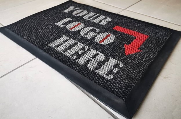 Logo Door Mat at a Business Entrance